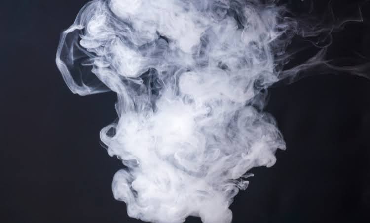 Swirling smoke on dark background
